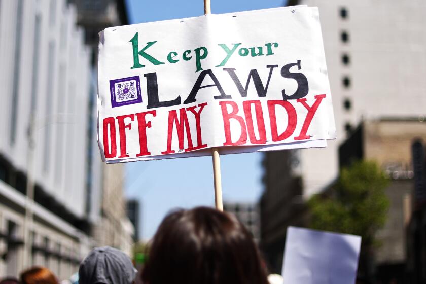 LOS ANGELES, CALIFORNIA - APRIL 15: Protestors demonstrate at the March for Reproductive Rights organized by Women’s March L.A. on April 15, 2023 in Los Angeles, California. The march was organized in response to a Texas federal judge’s ruling to rescind FDA approval of the abortion pill Mifepristone. U.S. Vice President Kamala Harris made a surprise appearance and speech at the event. (Photo by Mario Tama/Getty Images)