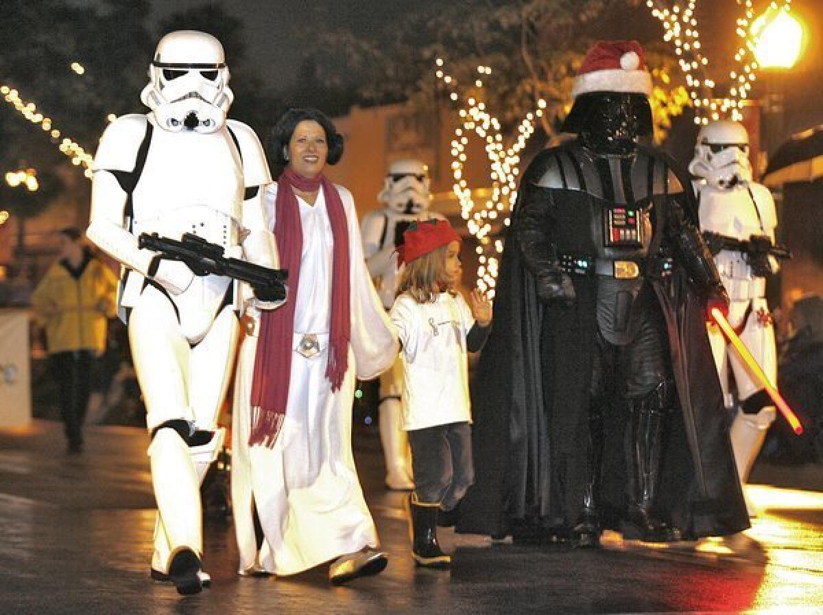 Storm troopers, Princess Leia Organa and Darth Vader entertained the crowds art the annual Montrose Christmas Parade in Montrose on Saturday.