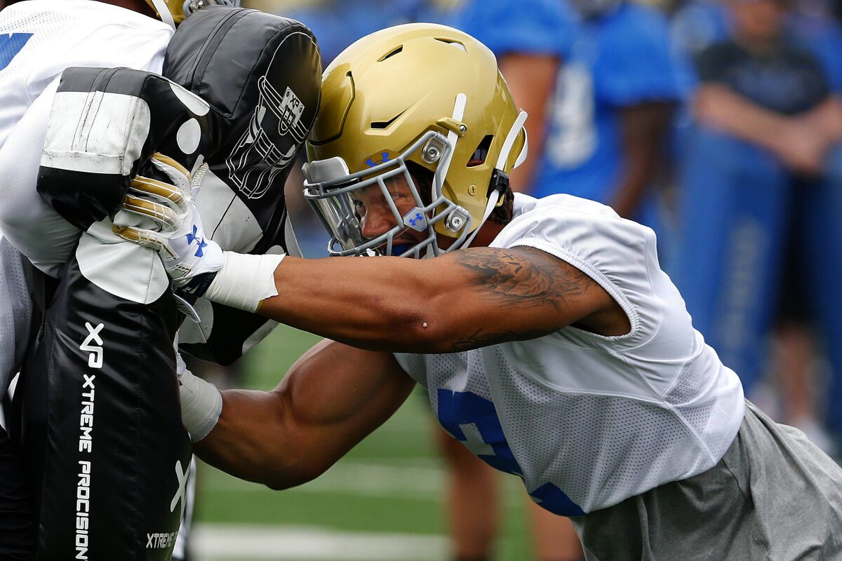 UCLA linebacker Josh Woods has played a vital role for the Bruins' defense this season after a gruesome knee injury derailed his 2018 season.