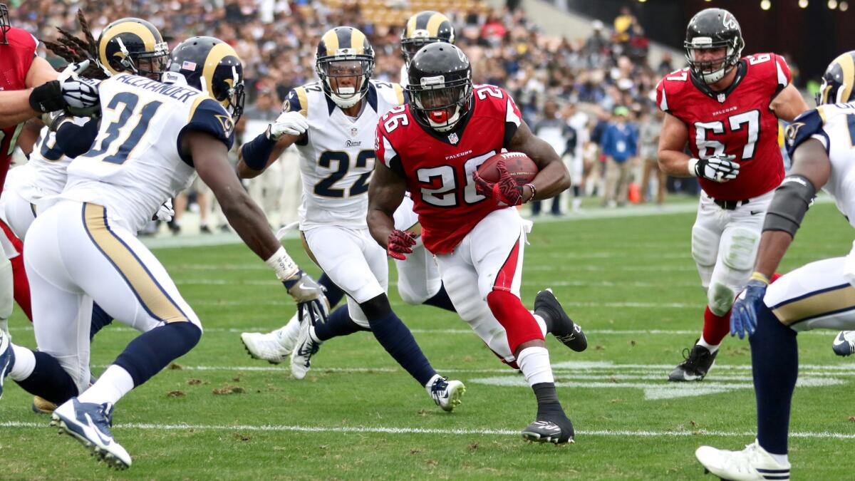 Falcons running back Tevin Coleman heads toward the end zone on a six-yard reception to give Atlanta a 14-0 lead in the second quarter.