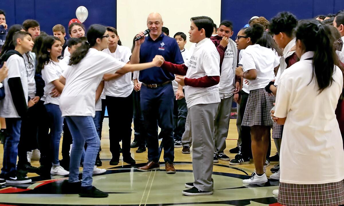 The tour of St. John Paul II STEM Academy on Friday for underclass members started with a game of rock, paper, scissors to break the ice.
