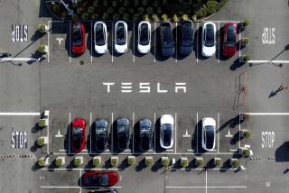 Tesla vehicles line a parking lot at the company's Fremont, Calif., factory as Israeli Prime Minister Benjamin Netanyahu visits the facility on Monday, Sept. 18, 2023. (AP Photo/Noah Berger)