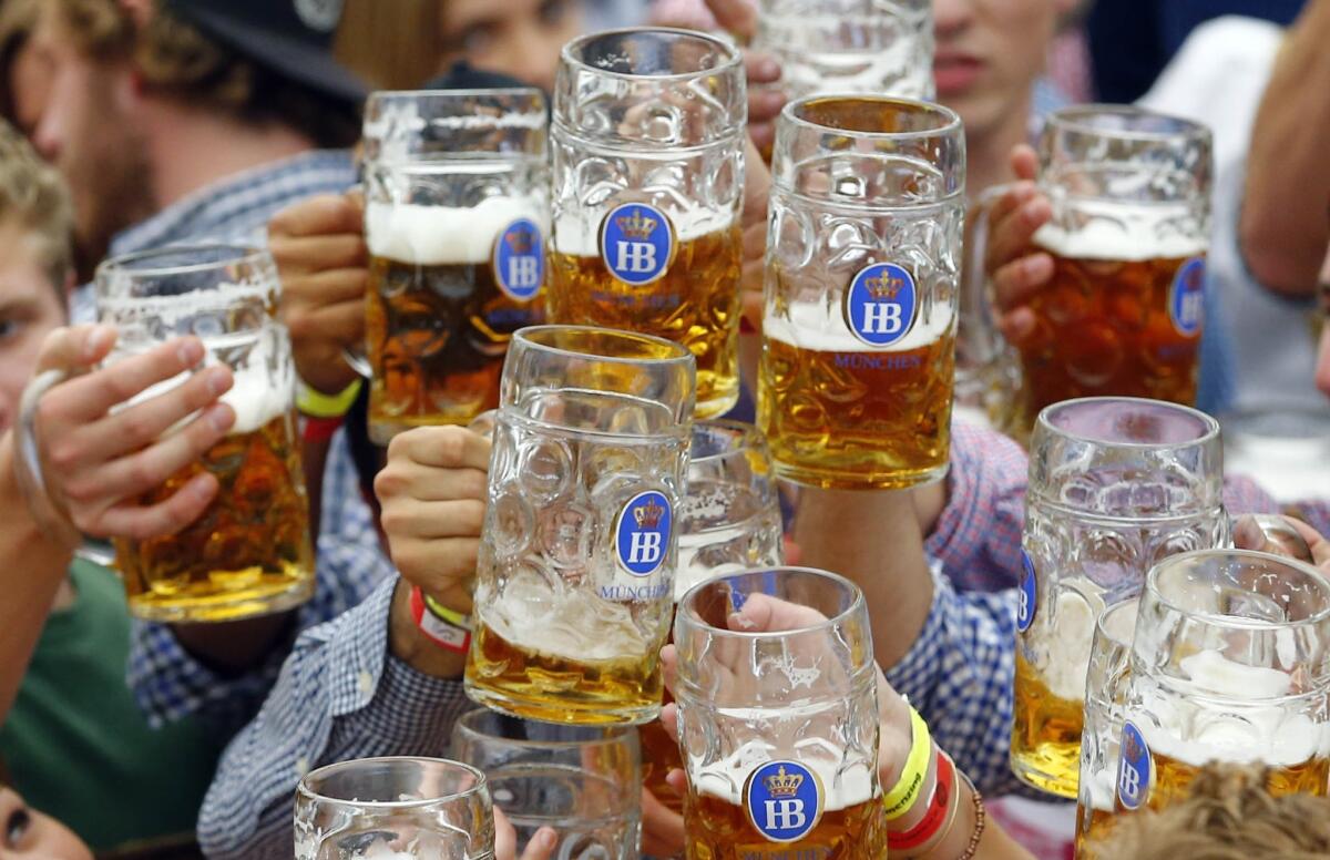 People celebrate the opening of the Oktoberfest beer festival in Munich, Germany, on Sept. 19, 2015.
