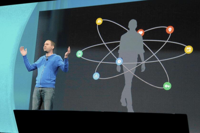 David Singleton, Android director of engineering, speaks about Android Wear at the Google I/O 2014 keynote presentation in San Francisco.