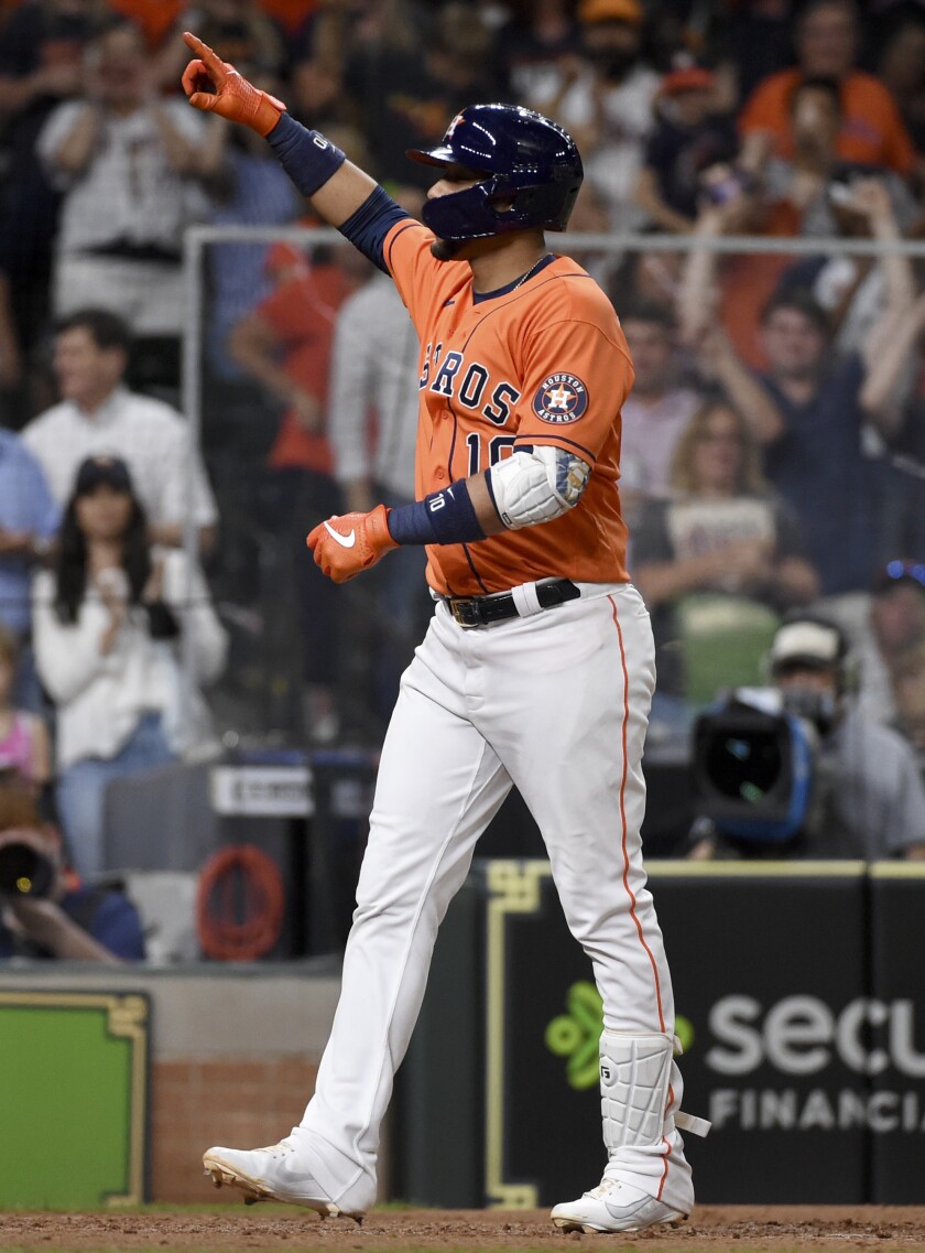 Houston Astros' Yuli Gurriel celebrates after his two-run home run during the fifth inning of baseball game against the Toronto Blue Jays, Friday, May 7, 2021, in Houston. (AP Photo/Eric Christian Smith)