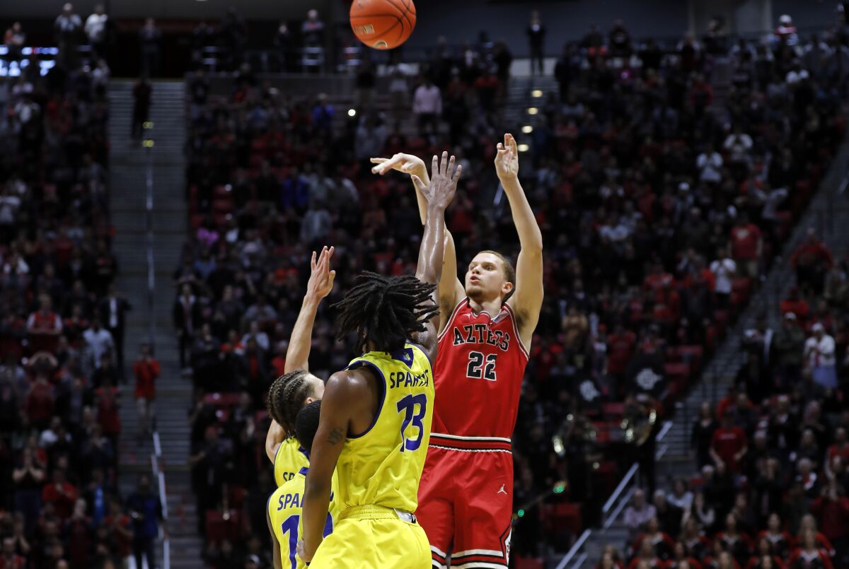 SDSU's Malachi Flynn shoots the winning 3-pointer with .9 seconds against San Jose State on Sunday at Viejas Arena.