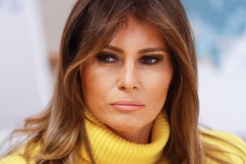 First Lady Melania Trump listens as she meets with personnel at Cincinnati Children's Hospital Medical Center, Monday, Feb. 5, 2018, in Cincinnati. (AP Photo/John Minchillo)