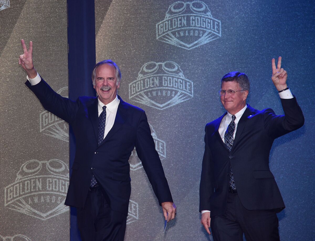 From left, John Naber and Bruce Furniss announce the winner of Relay Performance of the Year during the 2017 USA Swimming Golden Goggle Awards  at L.A. Live on November 19, 2017, in Los Angeles.