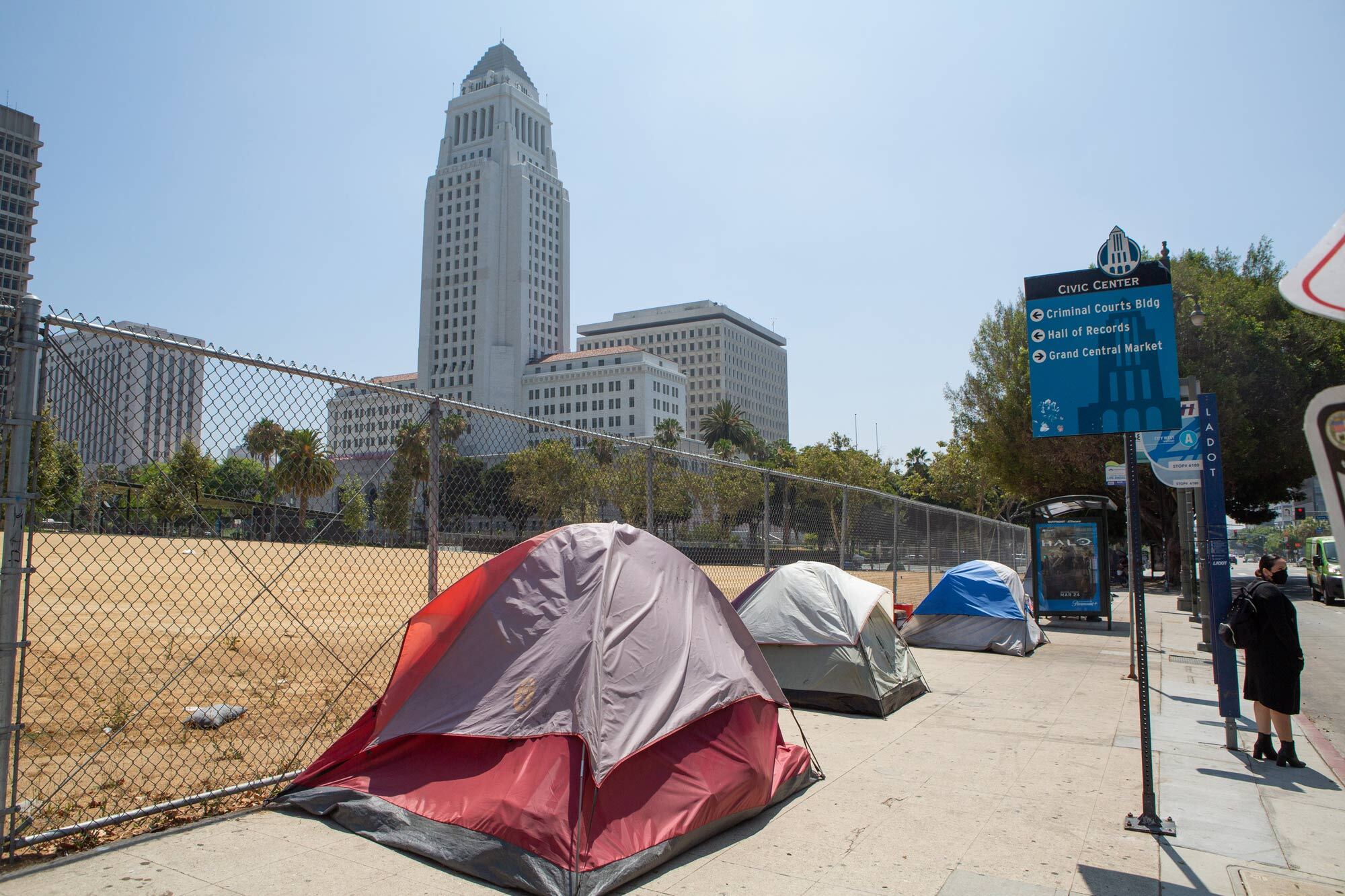 Encampments of unhoused people near City Hall in downtown Los Angeles.
