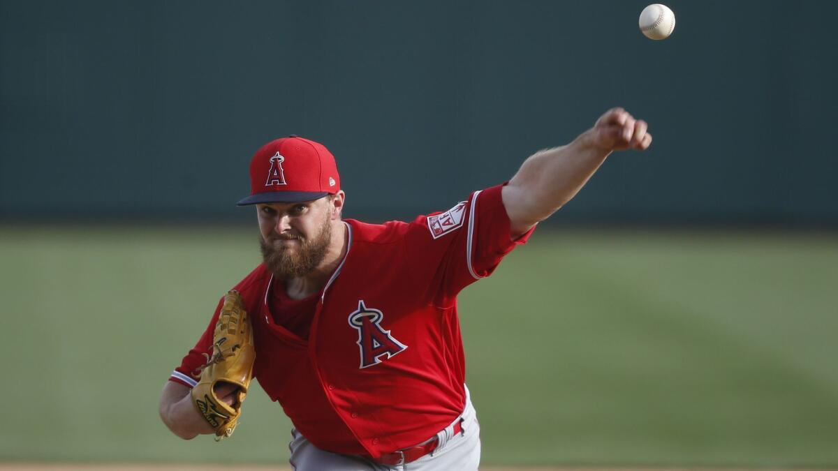Angels prospect Jared Walsh delivers a pitch against the Chicago White Sox on March 4.