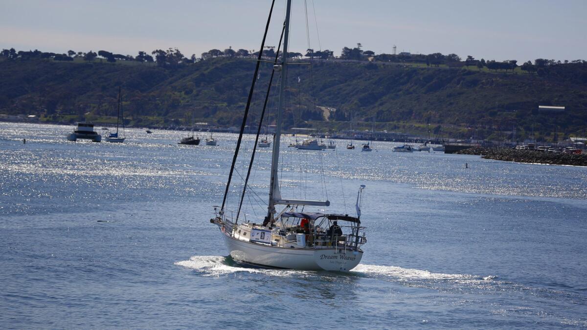 Mitsuhiro "Hiro" Iwamoto and Doug Smith leave San Diego Bay on a test sail in Smith's 40-foot sailboat, Dream Weaver. Iwamoto, who is blind, and Smith plan to leave Sunday on a two-month non-stop journey to Japan.