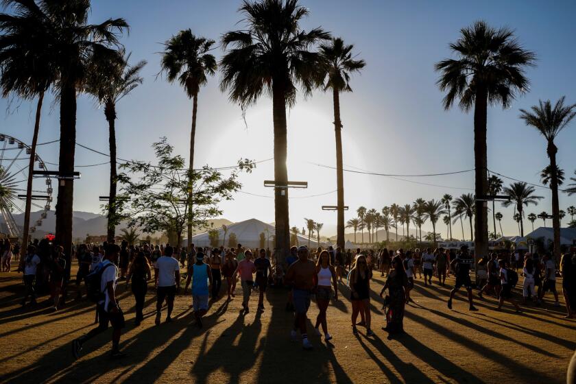 Shadows grow long on the second day of weekend two of the Coachella Valley Music and Arts Festival, on the Empire Polo grounds in Indio, CA, April 23, 2016. Coachella and a country music festival have together generated $403 million in economic impact.