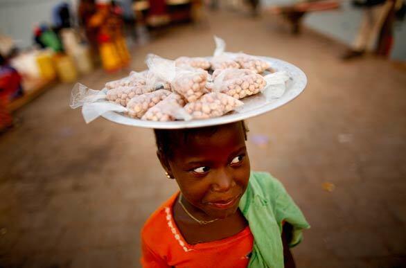 Aua Seide, 8, sells peanuts in Bissau, Guinea-Bissau. Raimundo Pereira, the head of parliament, was sworn in as interim president Tuesday after the nation's longtime president, Joao Bernardo Vieira, and his rival, armed forces chief Gen. Batiste Tagme na Waie, were assassinated this week.