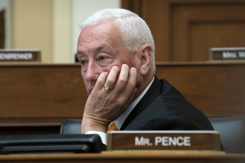 Rep. Greg Pence, R-Ind., listens as the House Foreign Affairs Committee holds a hearing titled, "The Betrayal of our Syrian Kurdish Partners," an examination of President Donald Trump's abrupt decision to withdraw from Syria and its impact on the Kurds and stability in the region, on Capitol Hill in Washington, Wednesday, Oct. 23, 2019. He is the brother of Vice President Mike Pence. (AP Photo/J. Scott Applewhite)