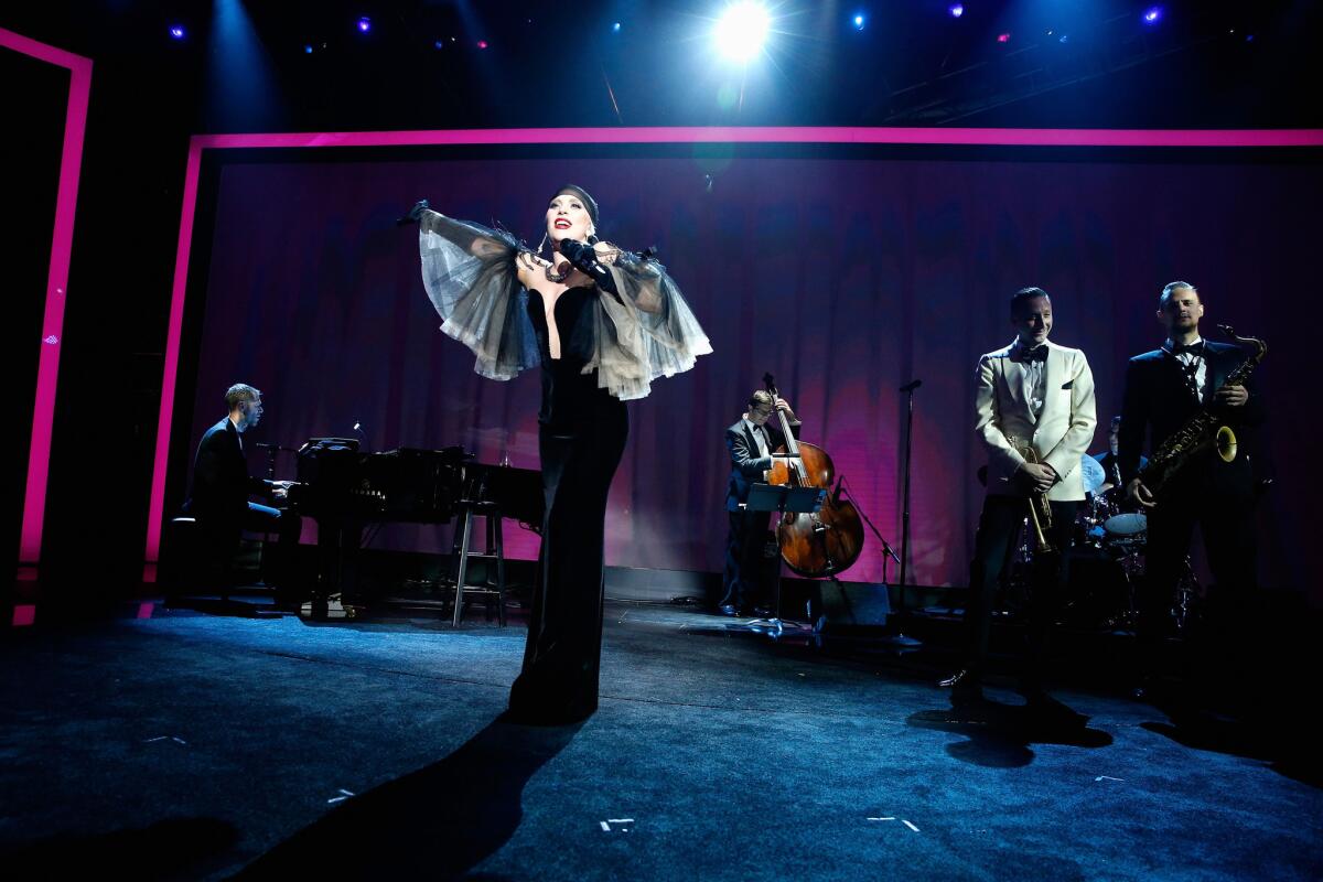 Lady Gaga performs onstage at the launch of the Parker Institute for Cancer Immunotherapy at the Los Angeles home of Napster co-founder Sean Parker and his wife, Alexandra.