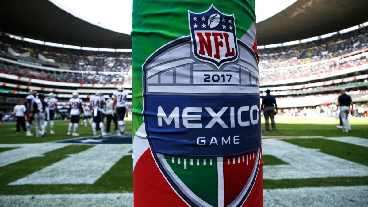 The logo for the NFL's Mexico Game is displayed on a goal post pad for a game between the Oakland Raiders and New England Patriots in Mexico City on Nov. 19, 2017.