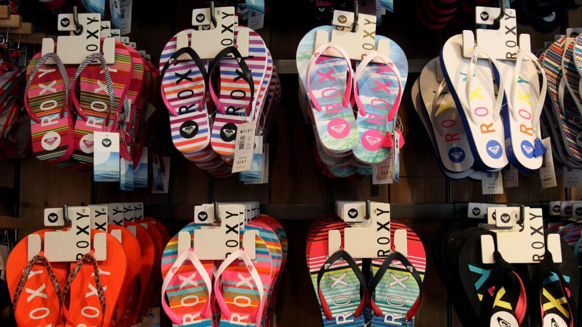 Roxy sandals at Quiksilver on the Third Street Promenade in Santa Monica. Boardriders Inc., which owns the Roxy and Quiksilver brands, has agreed to acquire Billabong International Ltd.