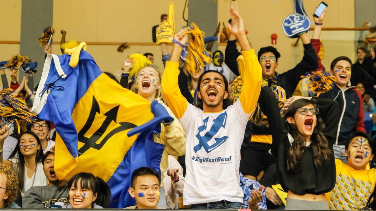 Fans cheer the UC San Diego women's basketball team during its game against Cal Poly Pomona on Friday at RIMAC Arena.