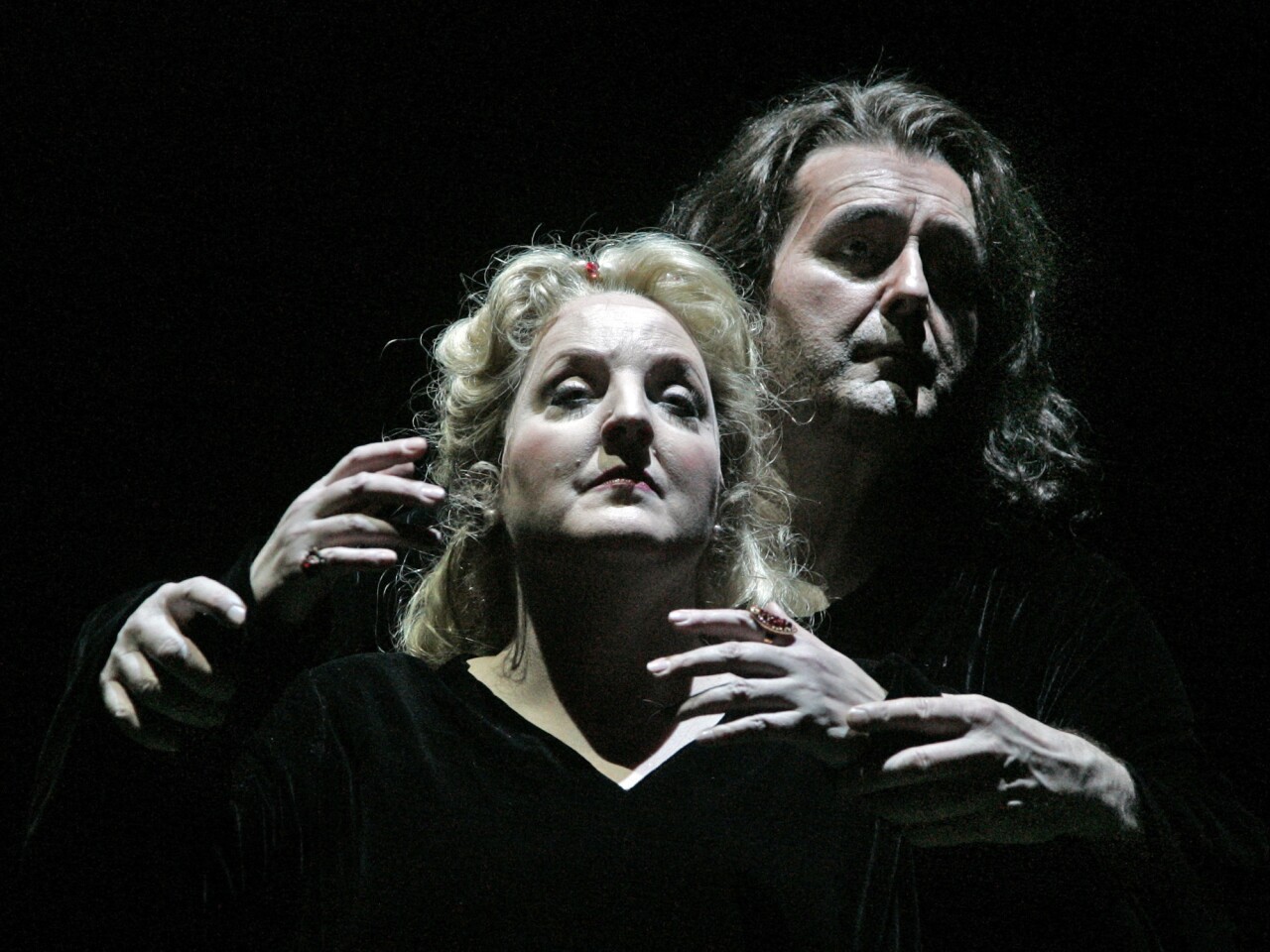 Above: A 2008 dress rehearsal of "Tristan and Isolde" by LA Opera with John Treleaven, right, as Tristan and Linda Wilson as Isolde in Act 3. Designed by David Hockney, the colorful staging of Wagner's masterpiece became a signature production of the young company. Other memorable productions created by the company include this season's "Il Foscari"; "Grendel," directed by Julie Taymor; and Herbert Ross' traditional "La Boheme."