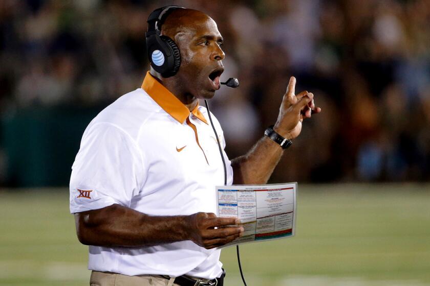 Texas Longhorns head coach Charlie Strong on the sidelines during the game against the Notre Dame Fighting Irish on Saturday.