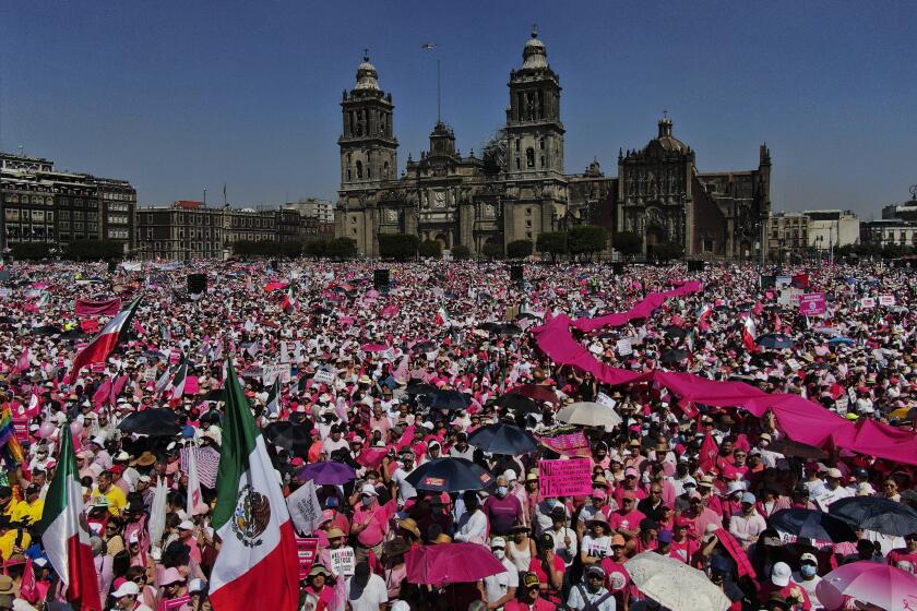 Anti-government demonstrators protest against recent reforms pushed by President Andres Manuel Lopez Obrador to the country's electoral law that they say threaten democracy, in Mexico City's main square, The Zocalo, Sunday, Feb. 26, 2023. (AP Photo/Fernando Llano)