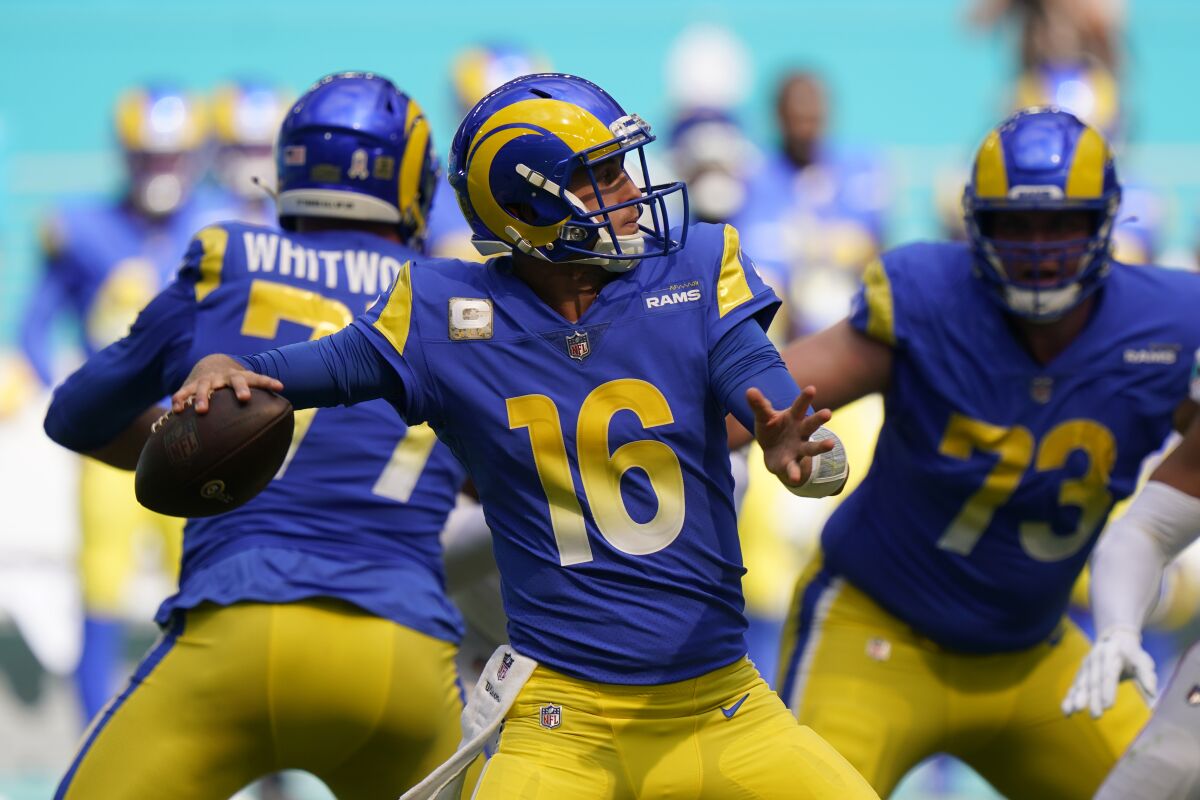 Los Angeles Rams quarterback Jared Goff (16) looks to pass during the first half of an NFL football game.