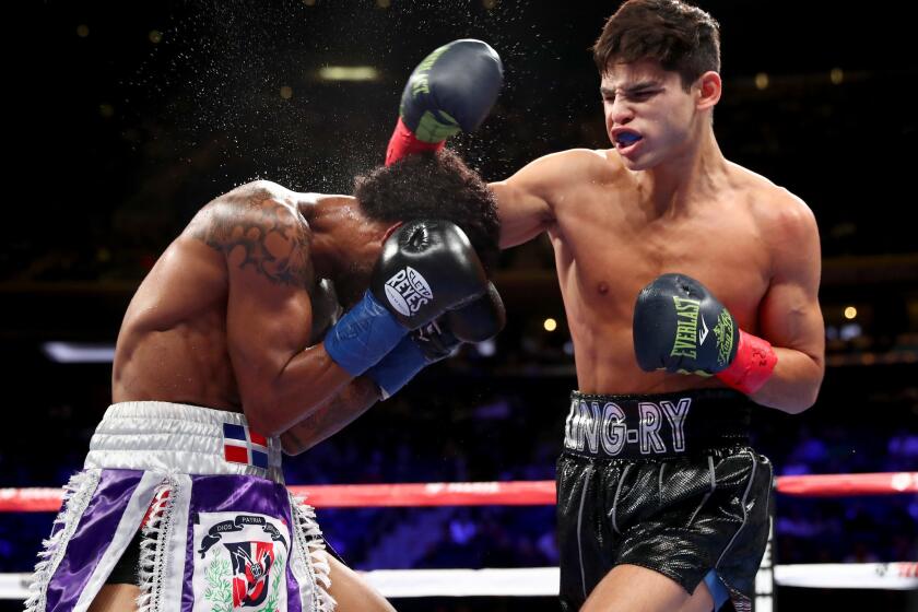 NEW YORK, NEW YORK - DECEMBER 15: Ryan Garcia (R) lands a punch against Braulio Rodriguez (L) during their Super Featherweight bout at Madison Square Garden on December 15, 2018 in New York City. (Photo by Al Bello/Getty Images) ** OUTS - ELSENT, FPG, CM - OUTS * NM, PH, VA if sourced by CT, LA or MoD **