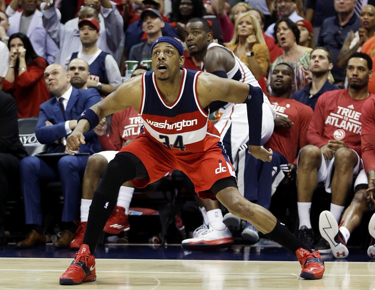Wizards forward Paul Pierce watches his three-point shot go in to give Washigton the lead, 81-80, in the late in Game 5 against the Atlanta Hawks.