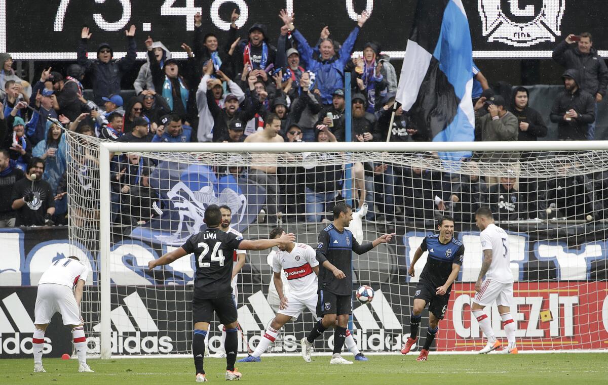 San Jose Earthquakes forward Chris Wondolowski, center, celebrates after scoring a goal against the Chicago Fire during the second half of an MLS soccer match in San Jose, Calif., Saturday, May 18, 2019. Wondolowski scored four times to pass Landon Donovan for most career MLS goals.