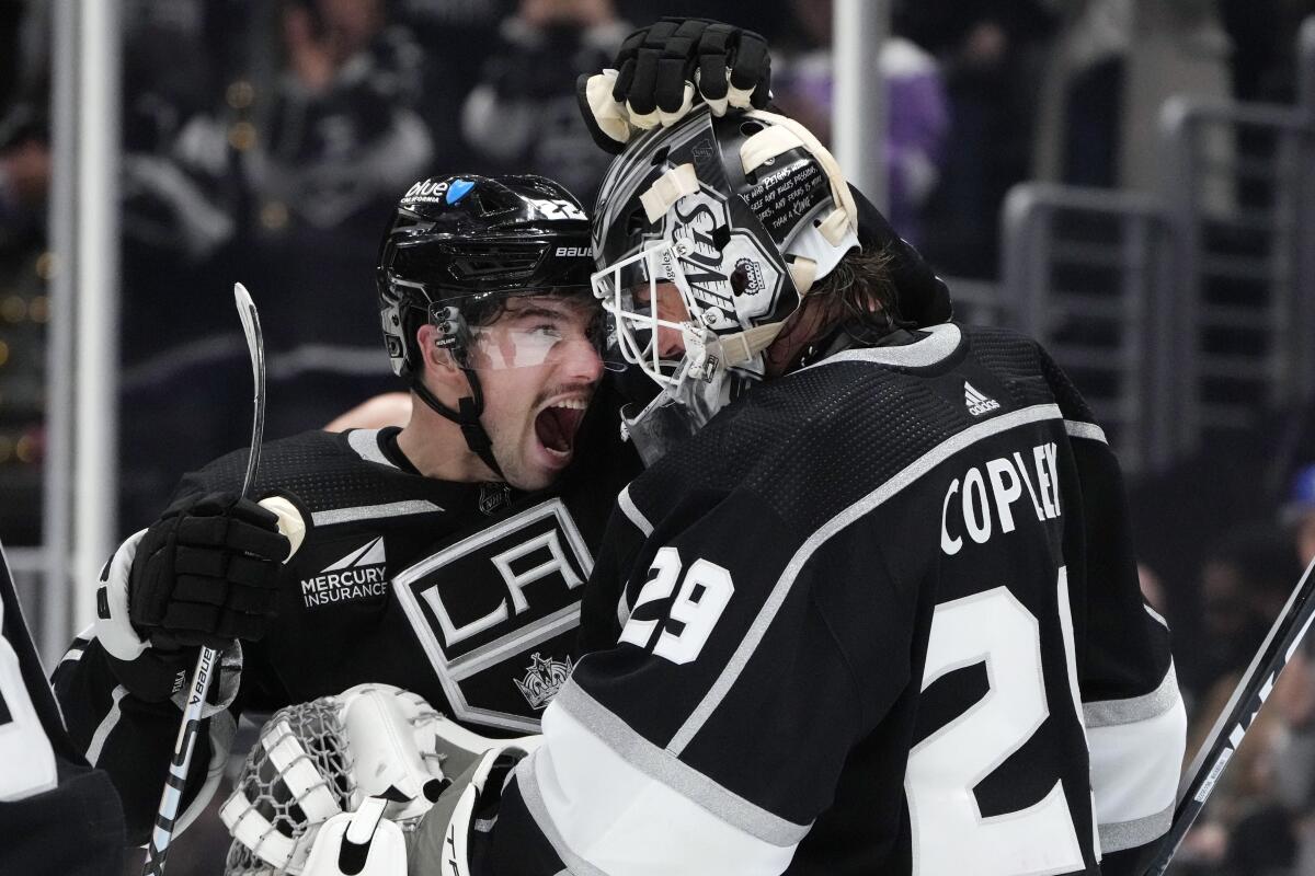 Kings left wing Kevin Fiala, left, congratulates goaltender Pheonix Copley after a shutout victory over the Canadiens.