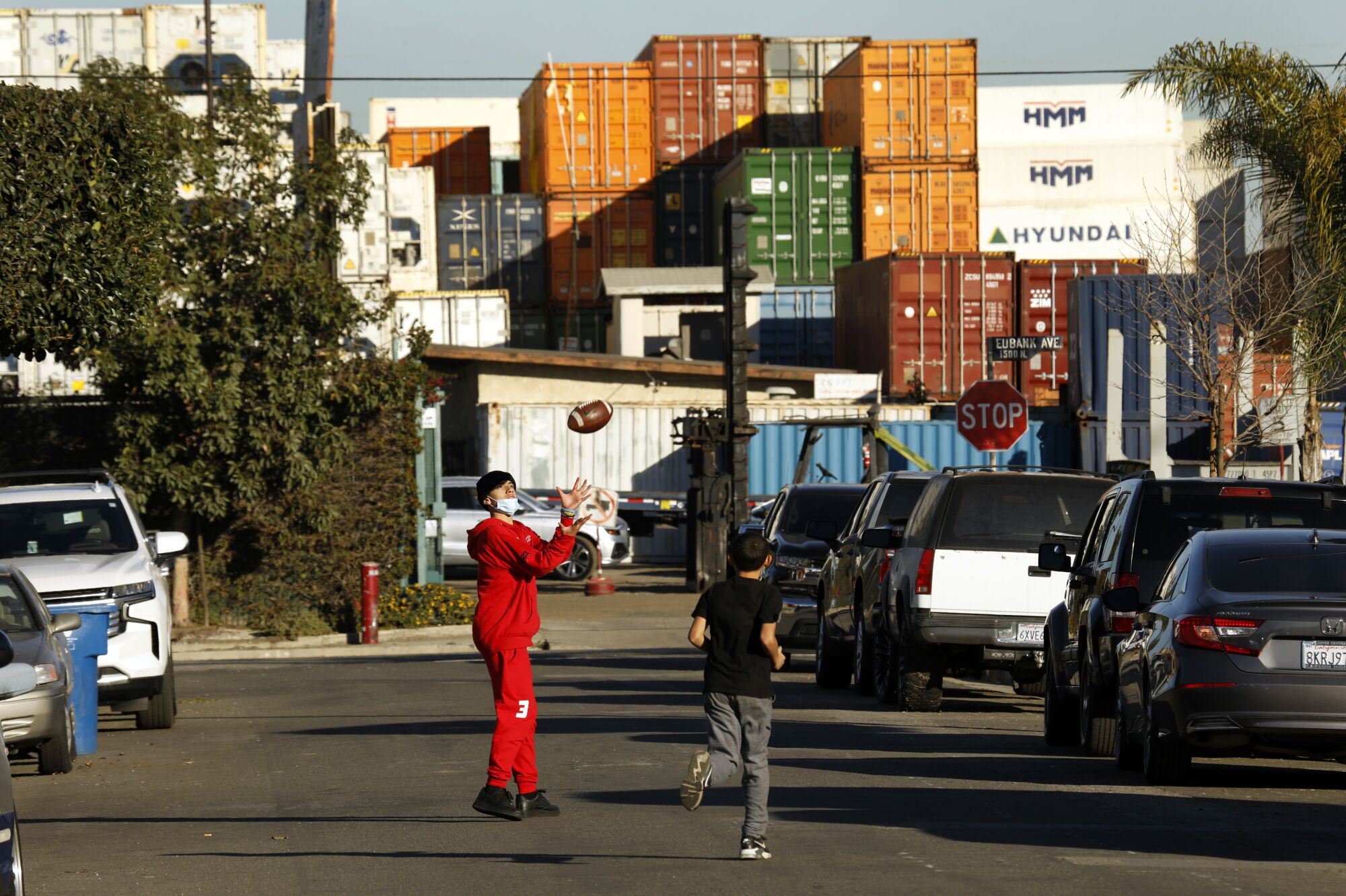 Containers are piled high in a lot off of Lomita Boulevard.