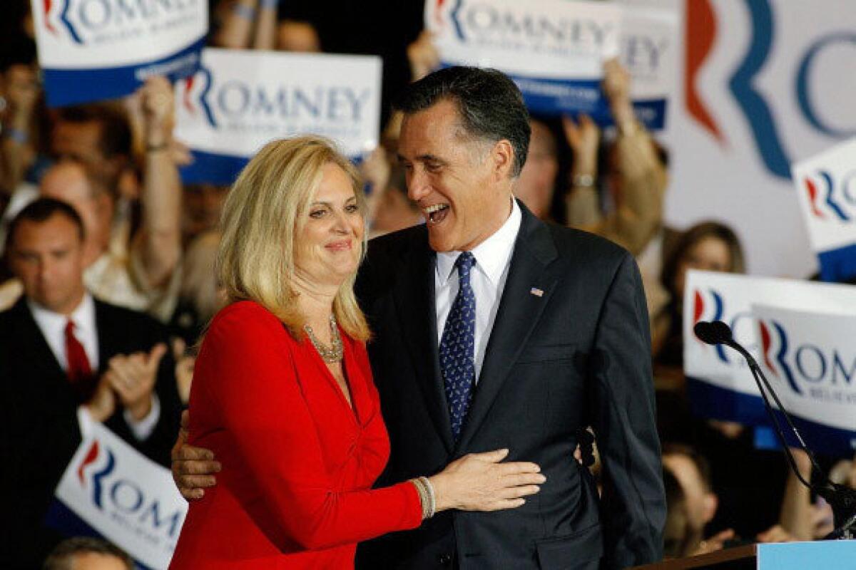 Republican presidential candidate, former Massachusetts Gov. Mitt Romney and his wife Ann Romney celebrate their victory in the Illinois GOP primary.