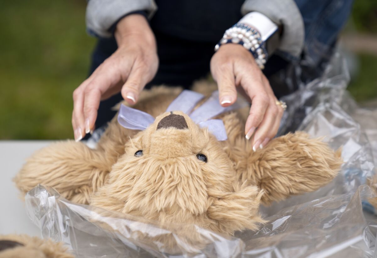 A Comfort Cub is fluffed and prepared for shipment to a student at Robb Elementary School in Uvalde, Texas 