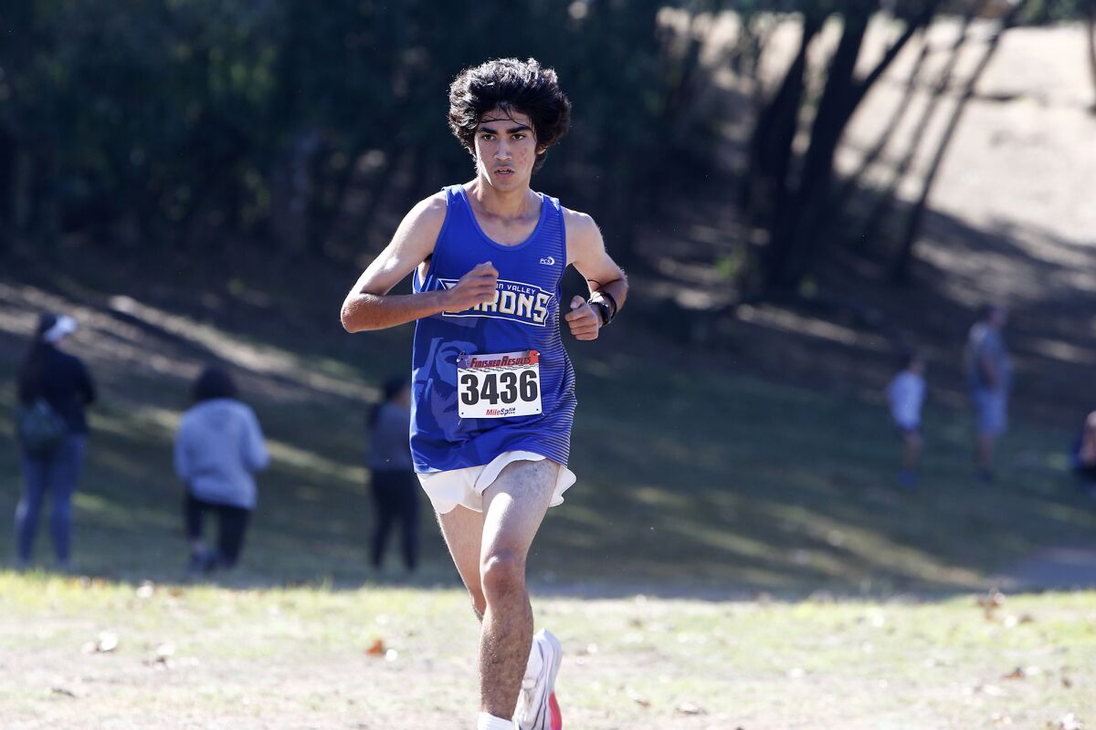 Fountain Valley's Diego Alonso competes in the Sunset Conference cross-country finals at Central Park on Saturday.