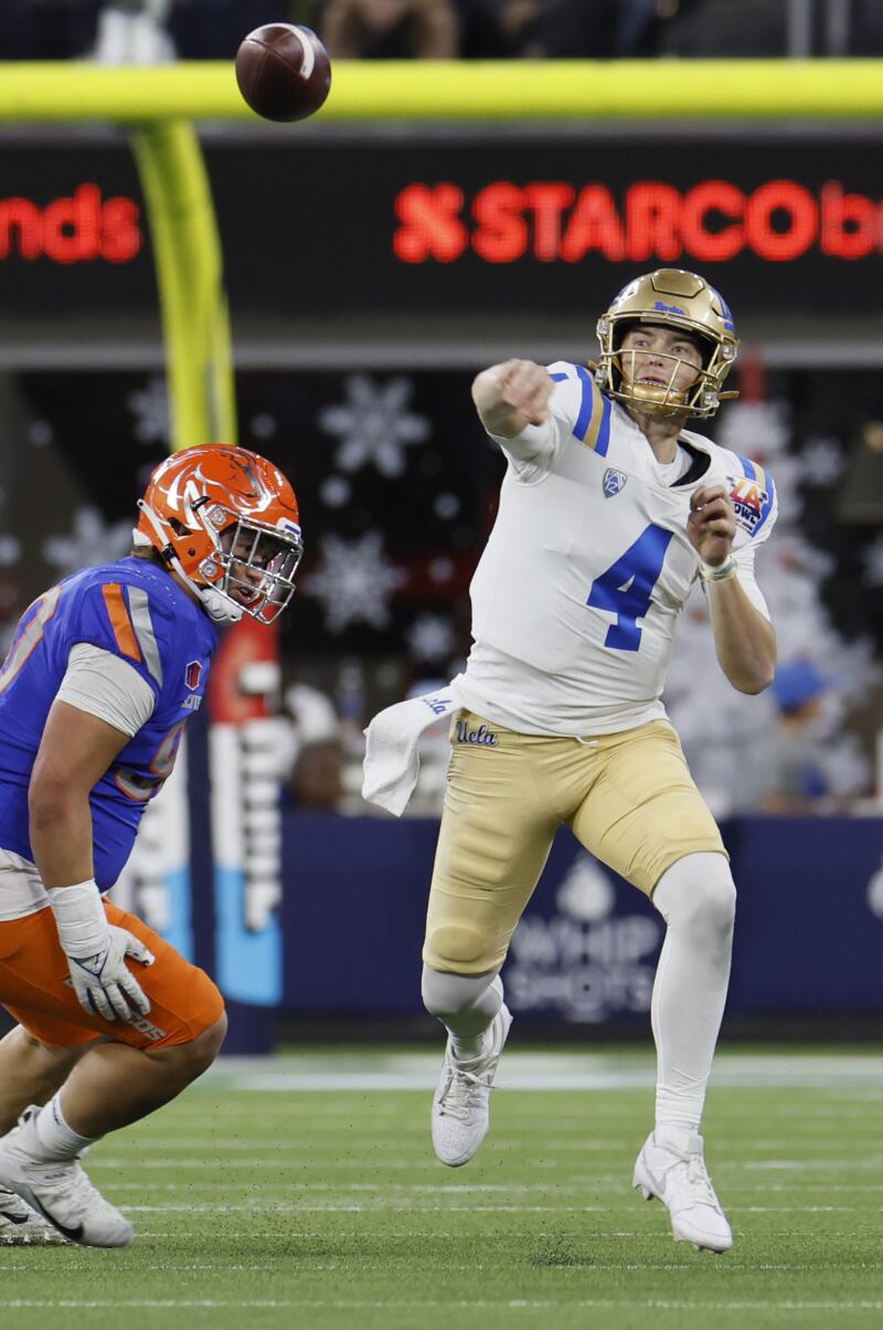 UCLA quarterback Ethan Garbers passes during the second half.