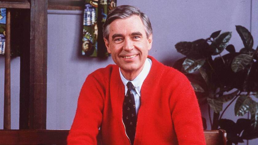In his trademark sweater, Mister Rogers on the set of his beloved TV program.