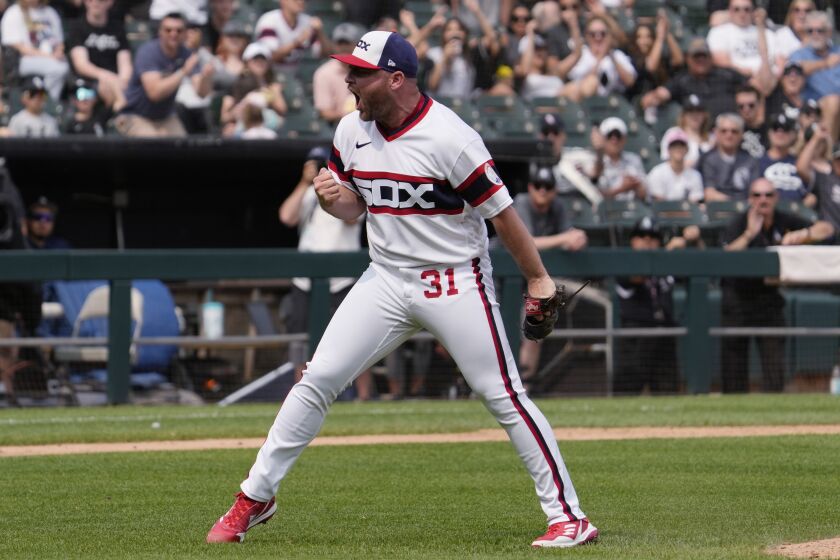 Chicago White Sox relief pitcher Liam Hendriks reacts after Detroit Tigers' Tyler Nevin struck out swinging during the ninth inning of a baseball game in Chicago, Sunday, June 4, 2023. (AP Photo/Nam Y. Huh)