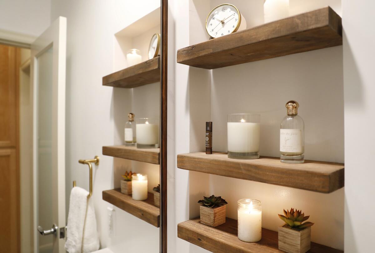 Wood shelving was added for open storage.