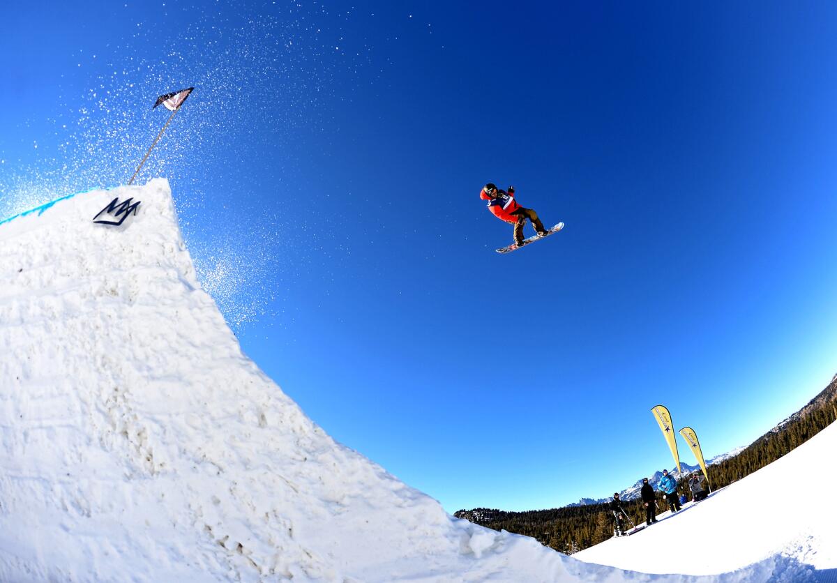 Ryan Stassel takes a leap during the snowboarding slopestyle final U.S. Olympic Qualification #4 at Mammoth Mountain ski resort on Jan. 16.