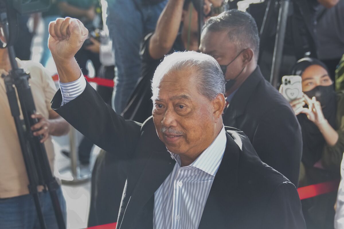 Former Malaysian Prime Minister Muhyiddin Yassin raising a fist