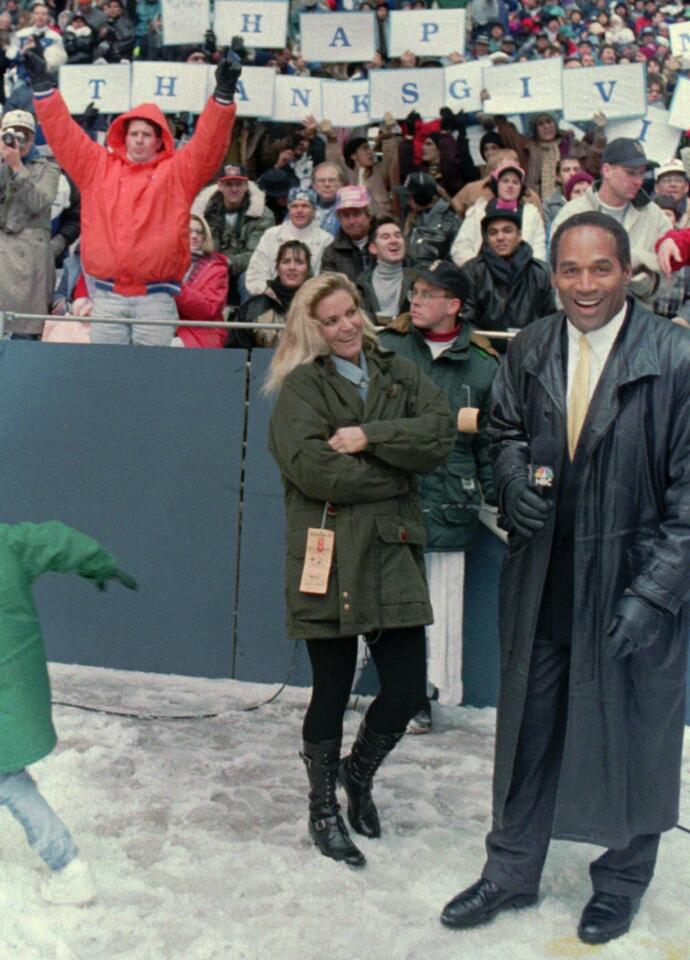 Simpson with his wife, Nicole Brown Simpson, at Texas Stadium in Irving, Texas.