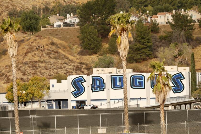 SANTA CLARITA CA NOVEMBER 14, 2019 -- At least five people were injured— two critically — in a shooting at Saugus High School when a gunman opened fire on the Santa Clarita campus early Thursday, November 14, 2019. (Al Seib / Los Angeles Times)