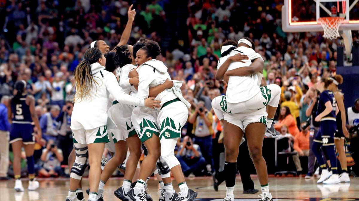 The Baylor Lady Bears celebrate their 82-81 win over the Notre Dame Fighting Irish.