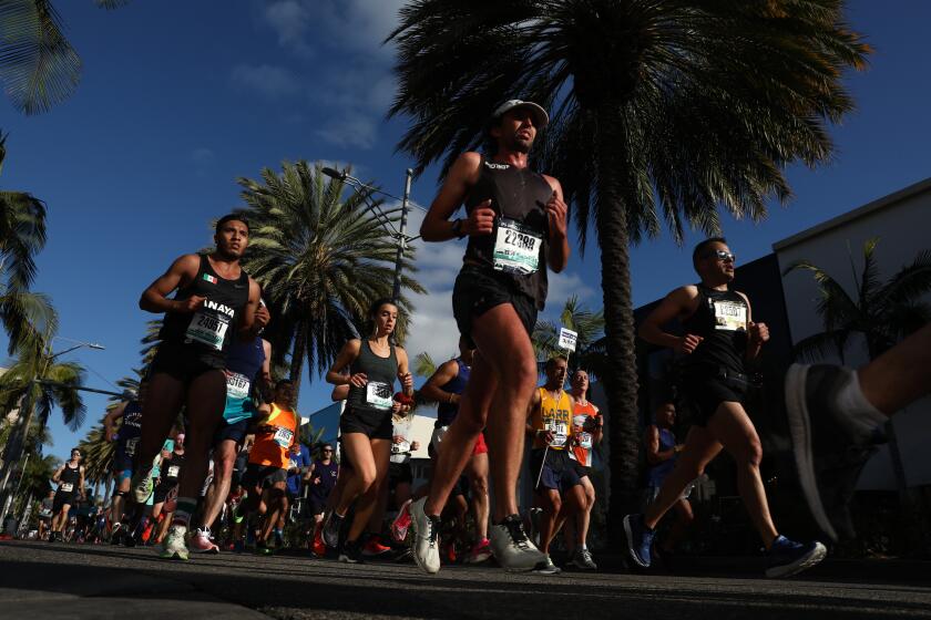 Runners during the 35th annual L.A. Marathon on Sunday, March 8, 2020 in Beverly Hills, California. (Patrick T. Fallon/ For The Los Angeles Times)