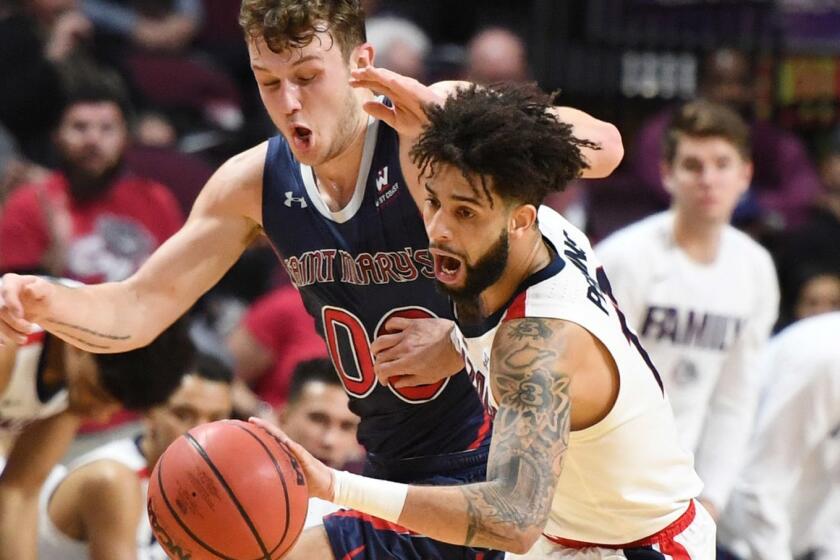 LAS VEGAS, NEVADA - MARCH 12: Josh Perkins #13 of the Gonzaga Bulldogs steals the ball from Tanner Krebs #00 of the Saint Mary's Gaels during the championship game of the West Coast Conference basketball tournament at the Orleans Arena on March 12, 2019 in Las Vegas, Nevada. (Photo by Ethan Miller/Getty Images) ** OUTS - ELSENT, FPG, CM - OUTS * NM, PH, VA if sourced by CT, LA or MoD **