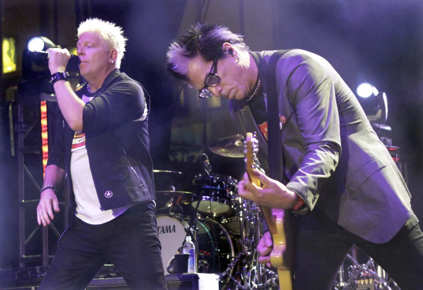 Noodles (right) and Dexter Holland (left) of The Offspring perform at The Sunset Strip Music Festivals street fair in West Hollywood.