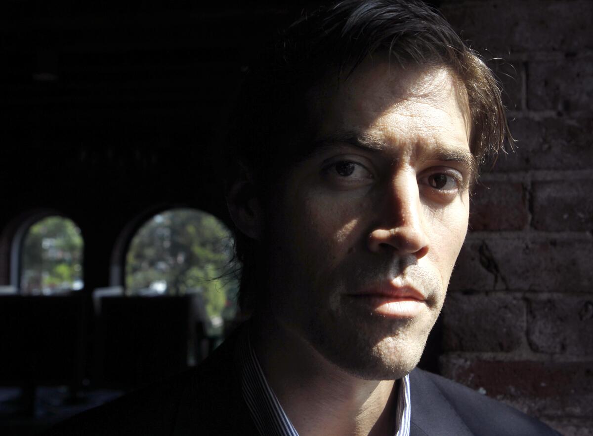 American Journalist James Foley poses for a photo in Boston on May 27, 2011. 