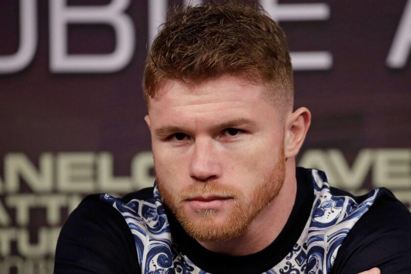 Canelo Alvarez attends a news conference, Wednesday, May 3, 2017, in Las Vegas. Alvarez is scheduled to fight Julio Cesar Chavez Jr. in a 164.5 pound catch weight boxing match Saturday in Las Vegas. (AP Photo/John Locher)