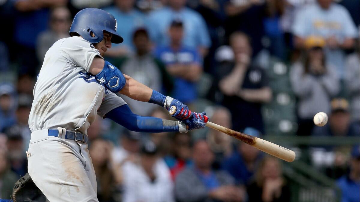 Cody Bellinger hits a home run in the ninth inning of the Dodgers' 6-5 victory over the Milwaukee Brewers on April 21.