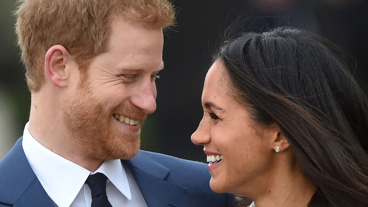 Prince Harry and Meghan Markle after announcing their engagement.